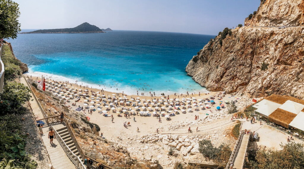 people on beach during daytime, in antalya