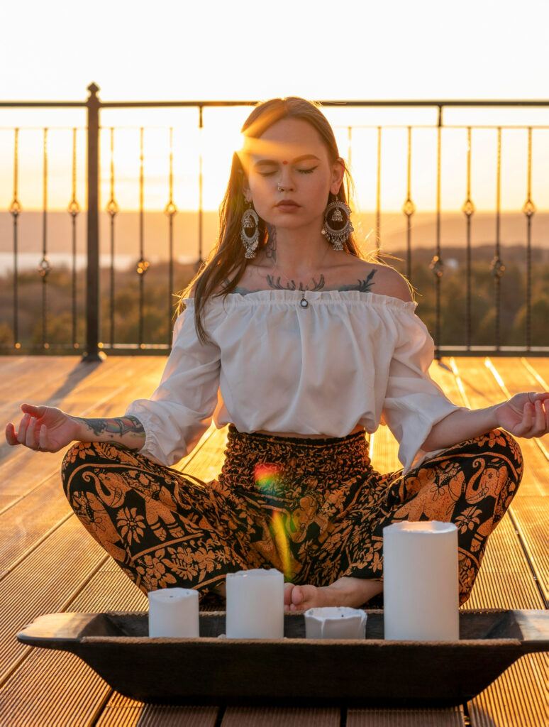 full shot woman sitting sunset