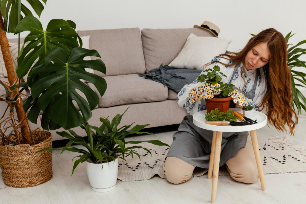 woman home with pot plant gardening tool
